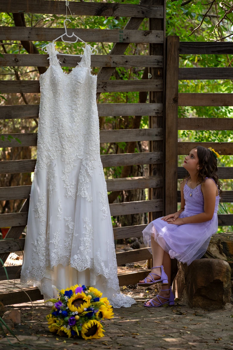 Wedding dress hanging outside, ready for the day